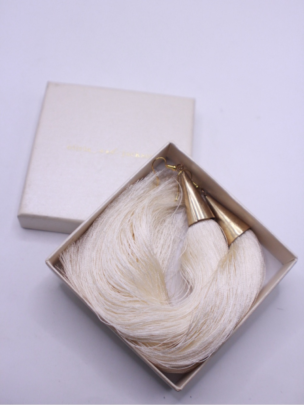 Olivia and Jackson white tassel earrings